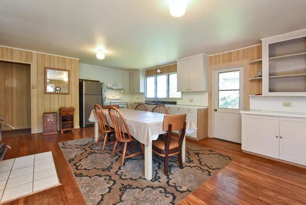 a view of a dining room with furniture