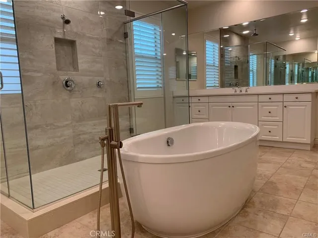 a bathroom with a sink a toilet and bathtub