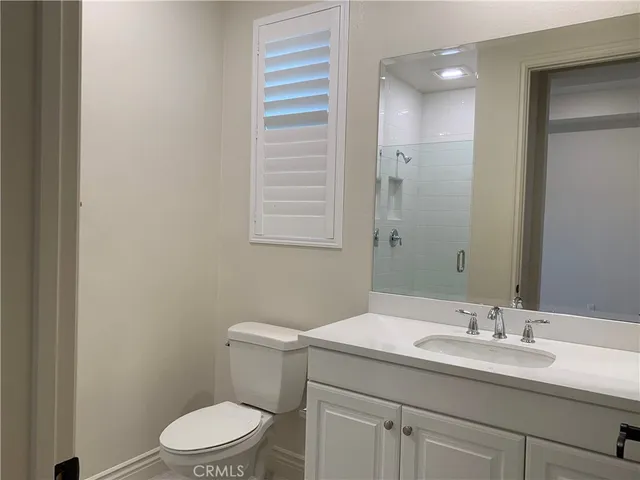 a open kitchen with granite countertop a sink and a stove