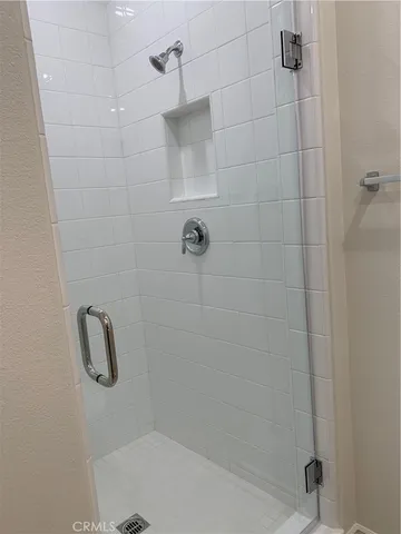 a large kitchen with stainless steel appliances lots of counter top space