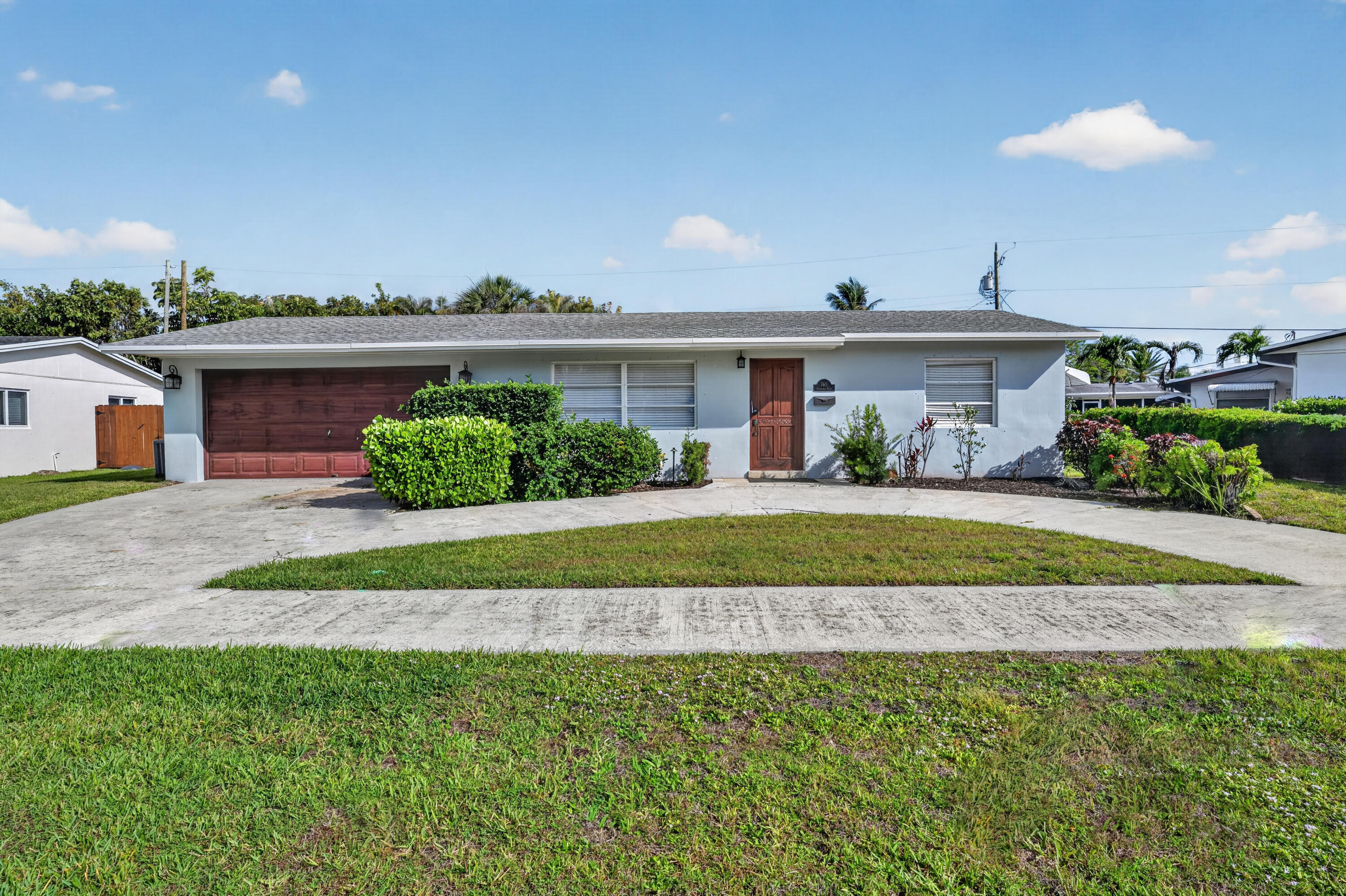 760 Cinnamon Road North Palm Beach, FL 33408 - Photo 2 of 19 Front of Home