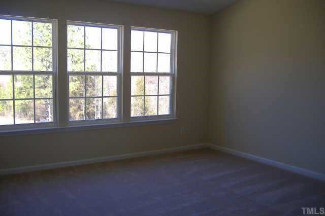 2604 Dutchman Creek Raleigh, NC 27610 - Photo 7 of 7 Large owner's suite with vaulted ceiiing and huge walk in closet Other