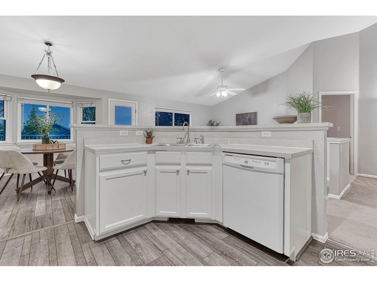 7032 Avondale Road Fort Collins, CO 80525 - Photo 11 of 40 This kitchen is prime for your personal touches and updates.