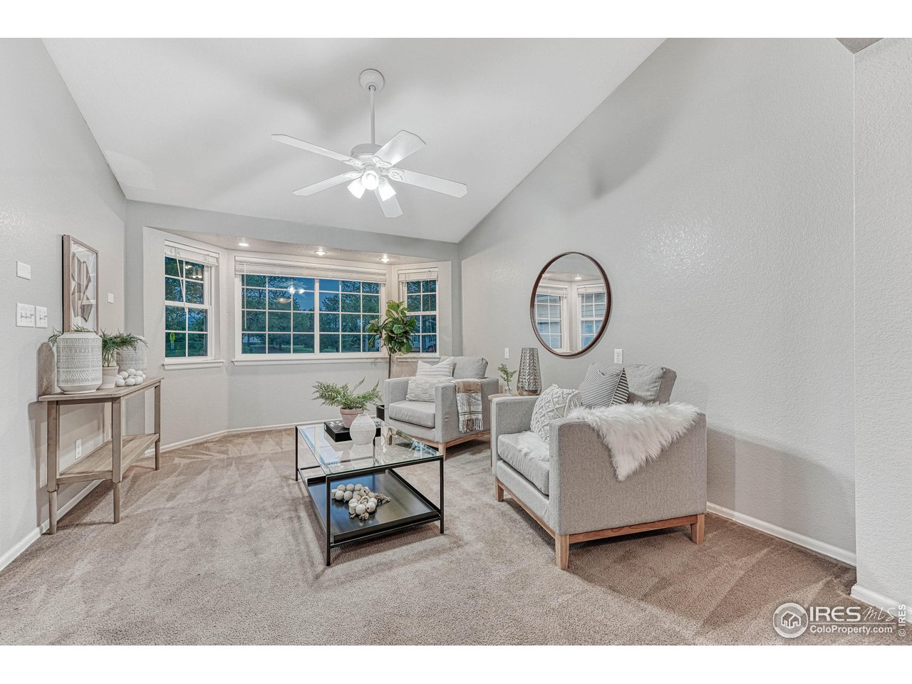 7032 Avondale Road Fort Collins, CO 80525 - Photo 6 of 40 Bay window area provides views of the park and lets in an abundance of natural light.