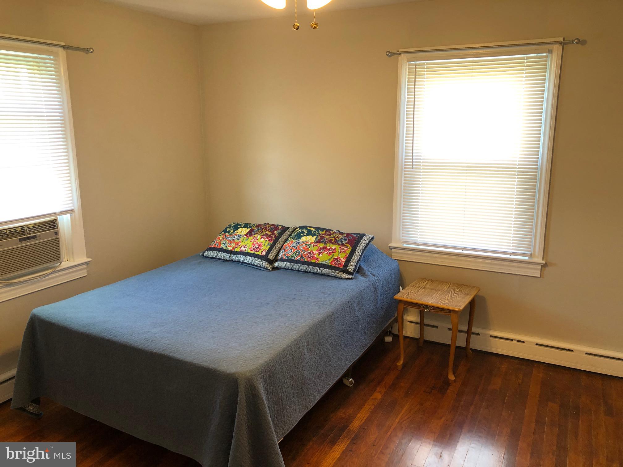 20618 Ridge Road Colonial Beach, VA 22443 - Photo 16 of 25 a bedroom with a bed and a window