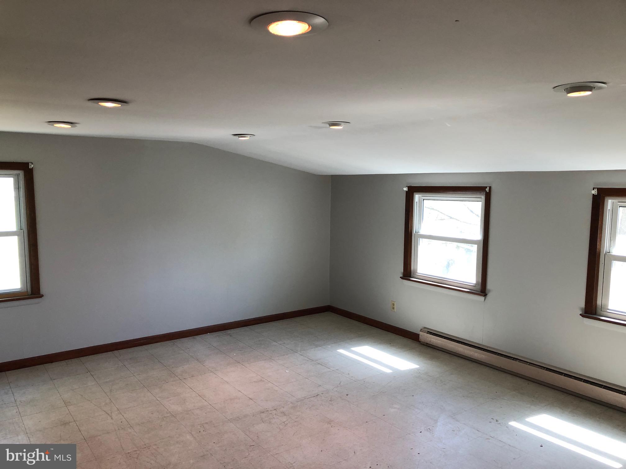 20618 Ridge Road Colonial Beach, VA 22443 - Photo 22 of 25 an empty room with windows