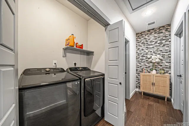 a storage room with washer and dryer