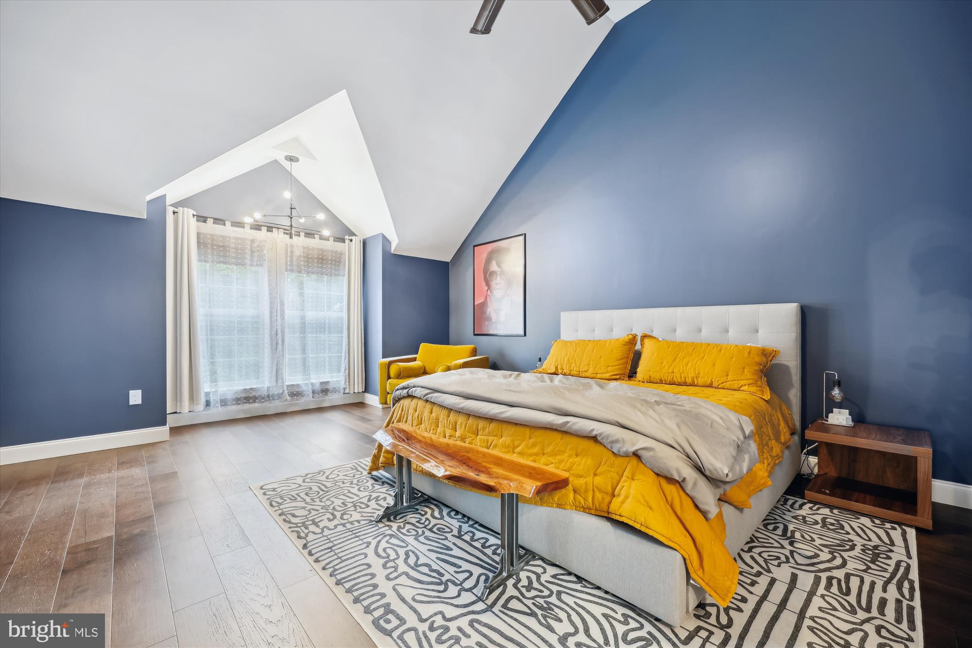 8103 Piney Branch Road Silver Spring, MD 20910 - Photo 19 of 42 a bed sitting in a bedroom next to a window