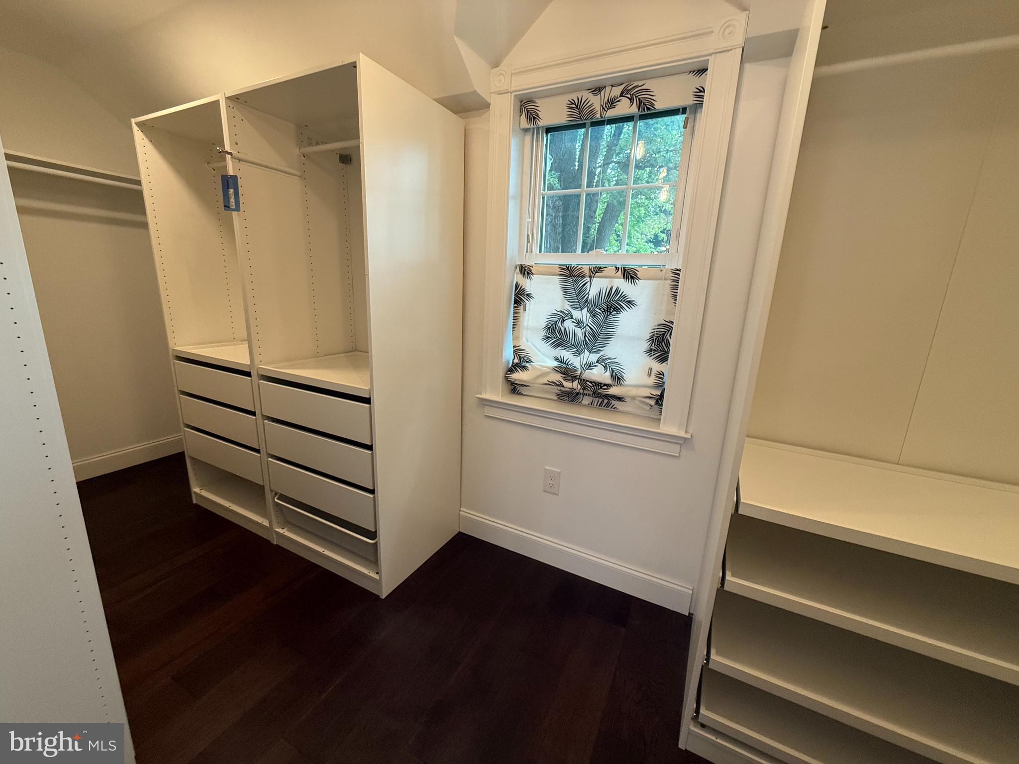 8103 Piney Branch Road Silver Spring, MD 20910 - Photo 23 of 42 a view of walk in closet with empty racks