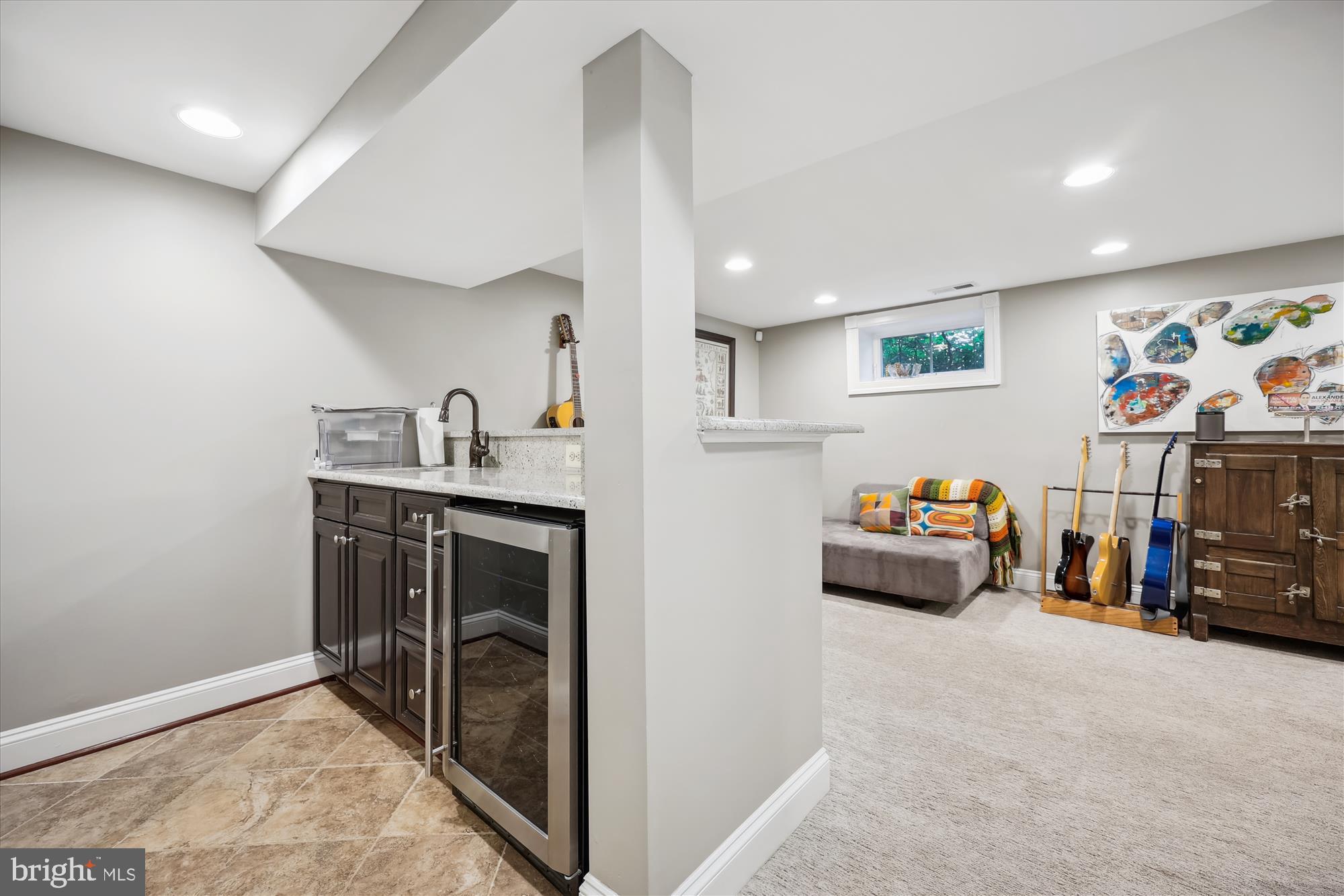 8103 Piney Branch Road Silver Spring, MD 20910 - Photo 28 of 42 a utility room with furniture a washer and dryer