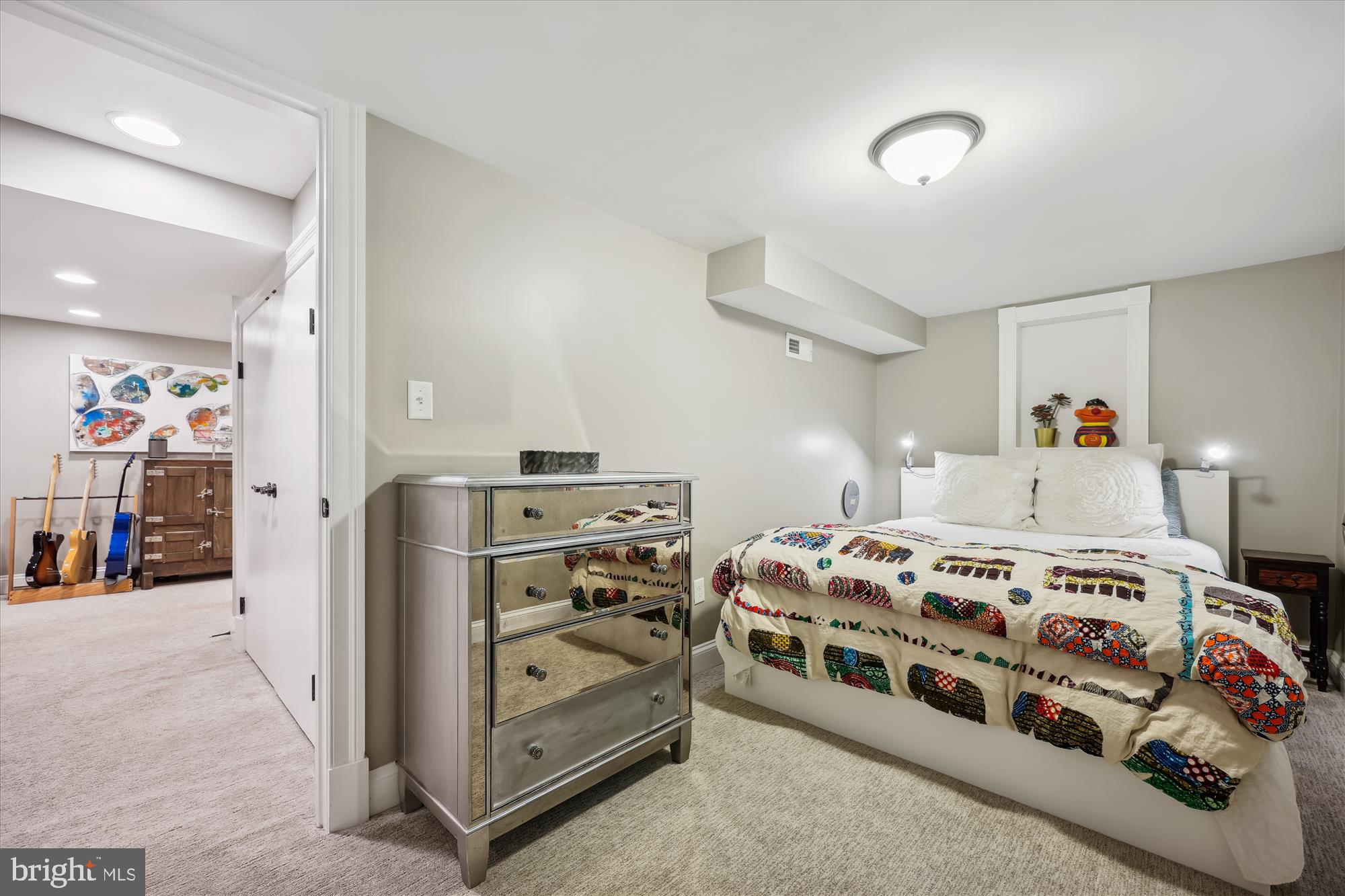 8103 Piney Branch Road Silver Spring, MD 20910 - Photo 29 of 42 a bedroom with a bed and a tv