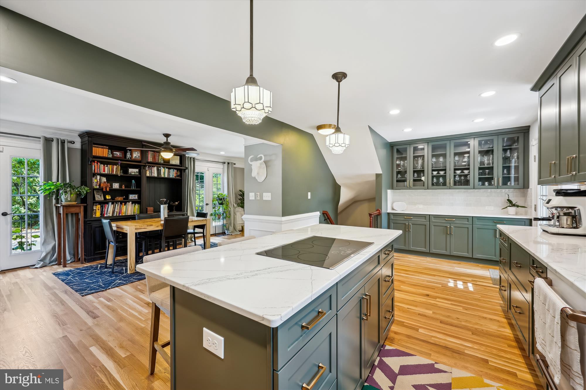 8103 Piney Branch Road Silver Spring, MD 20910 - Photo 8 of 42 a kitchen with a stove a counter space a sink and cabinets