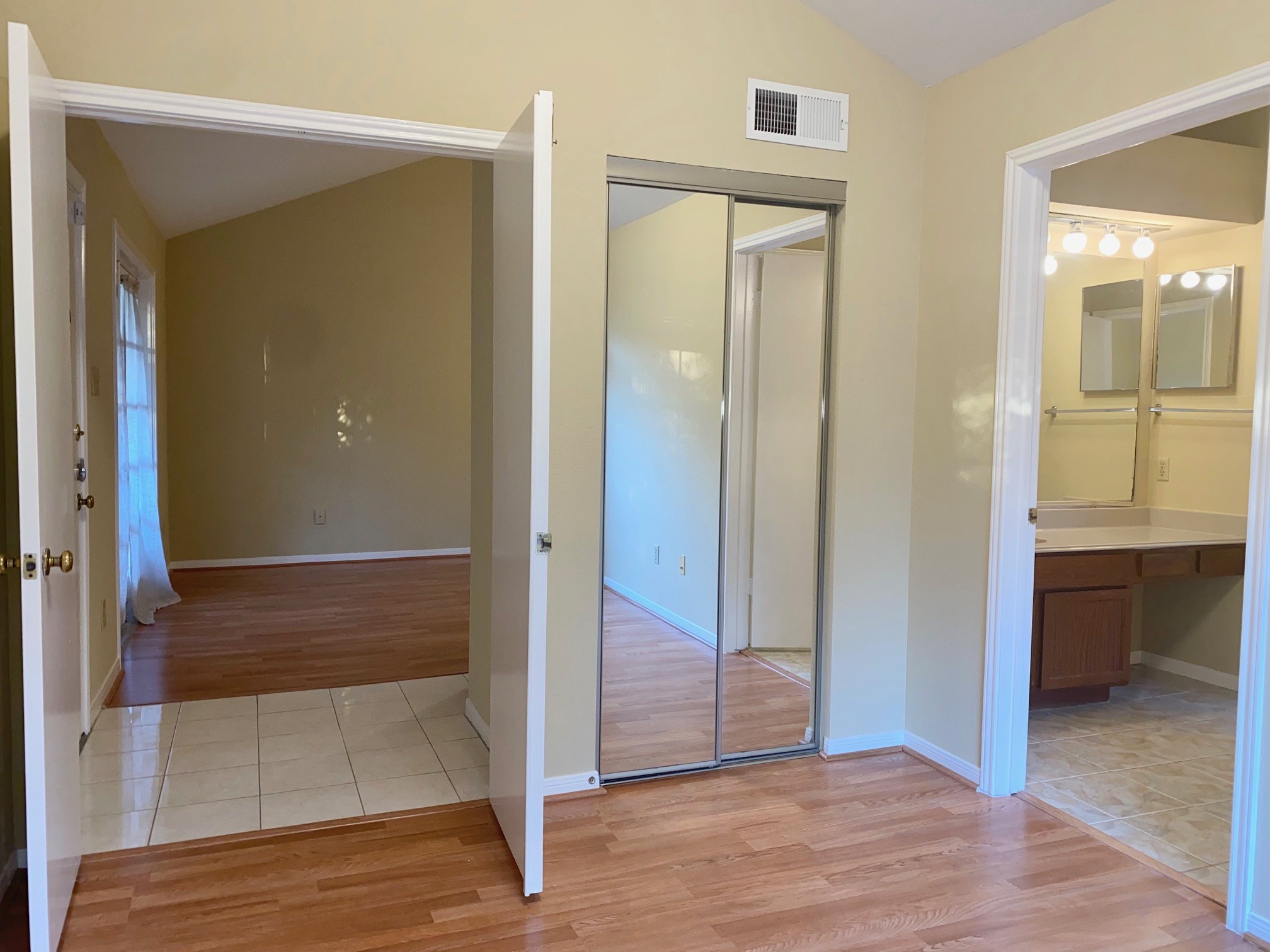 8055 Cambridge Street, Unit 14 Houston, TX 77054 - Photo 23 of 26 a view of a hallway with wooden floor