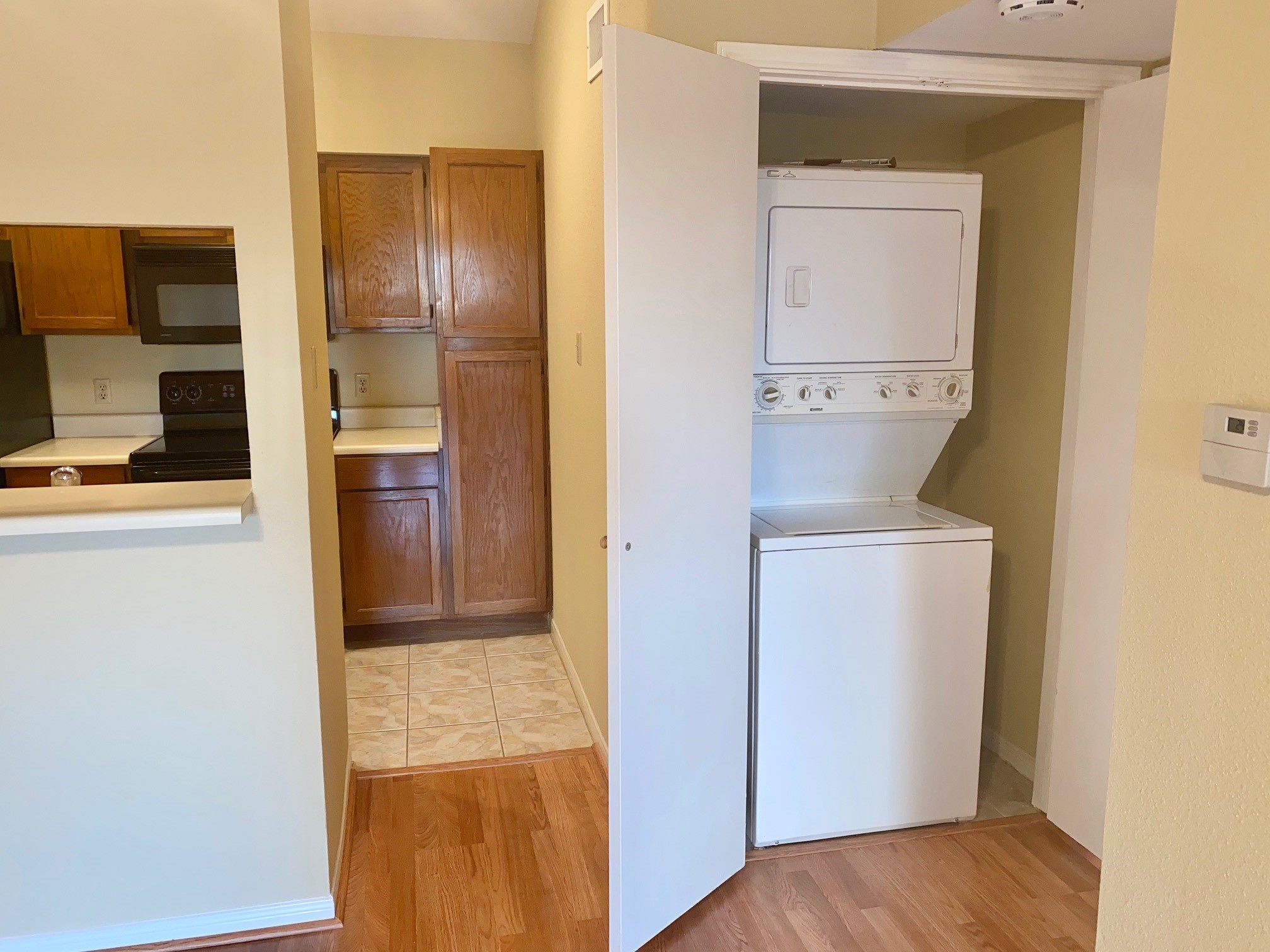 8055 Cambridge Street, Unit 14 Houston, TX 77054 - Photo 8 of 26 a view of hallway with washer and dryer