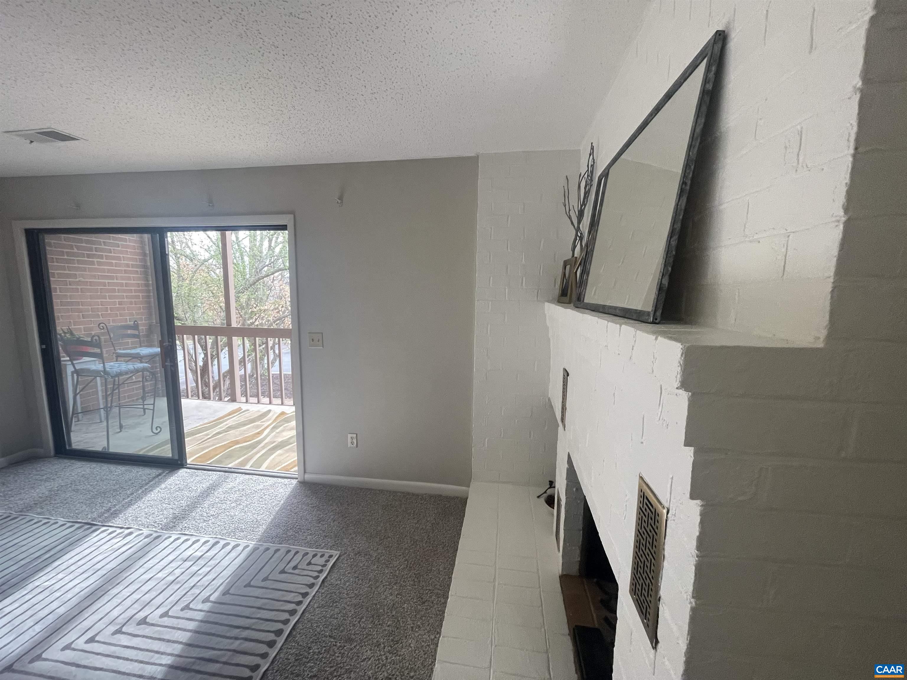 115 Turtle Creek Road, Unit 8 Charlottesville, VA 22901 - Photo 15 of 40 a bedroom with a bed and a window