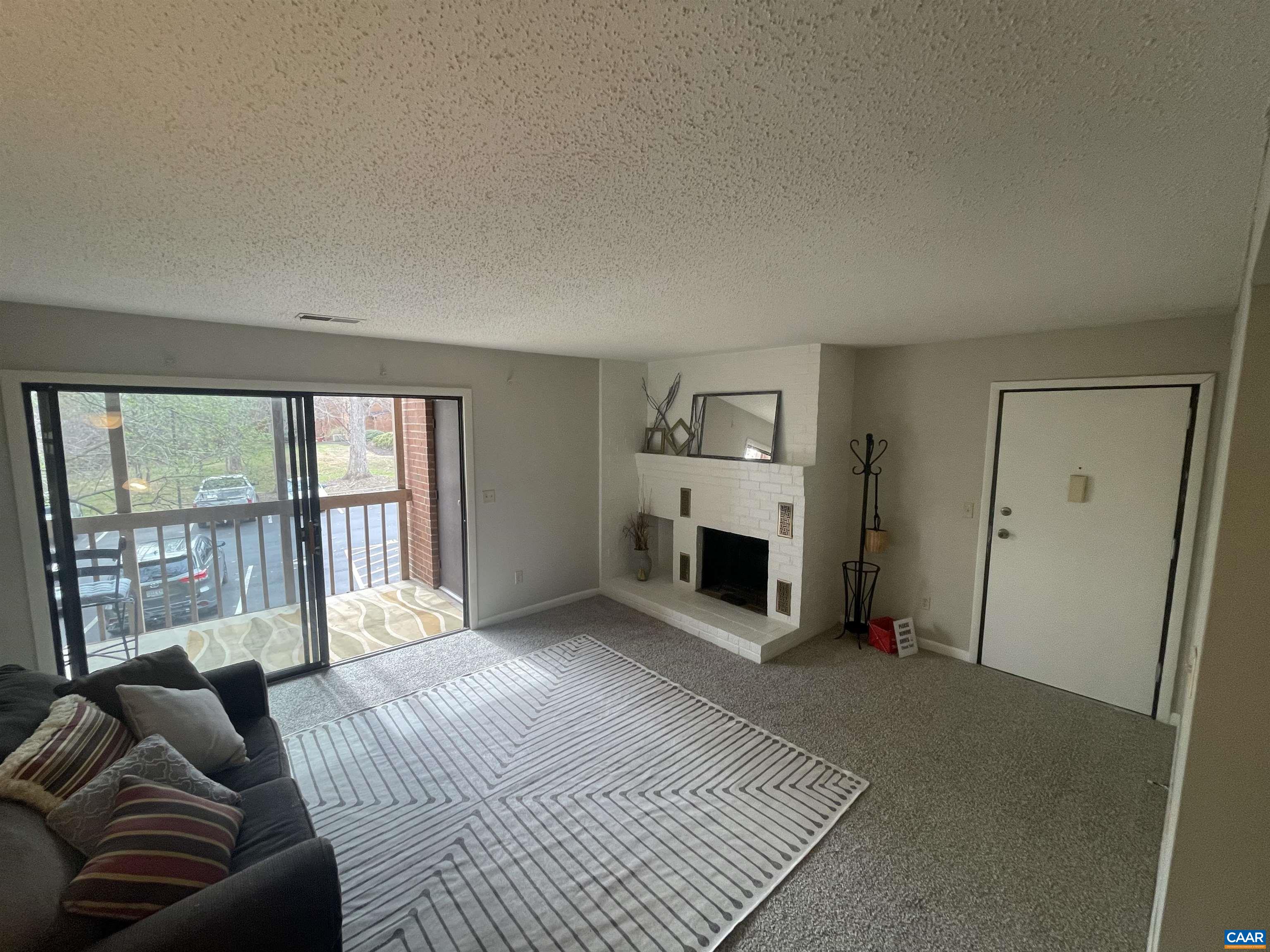 115 Turtle Creek Road, Unit 8 Charlottesville, VA 22901 - Photo 16 of 40 a spacious bedroom with a large bed and a window