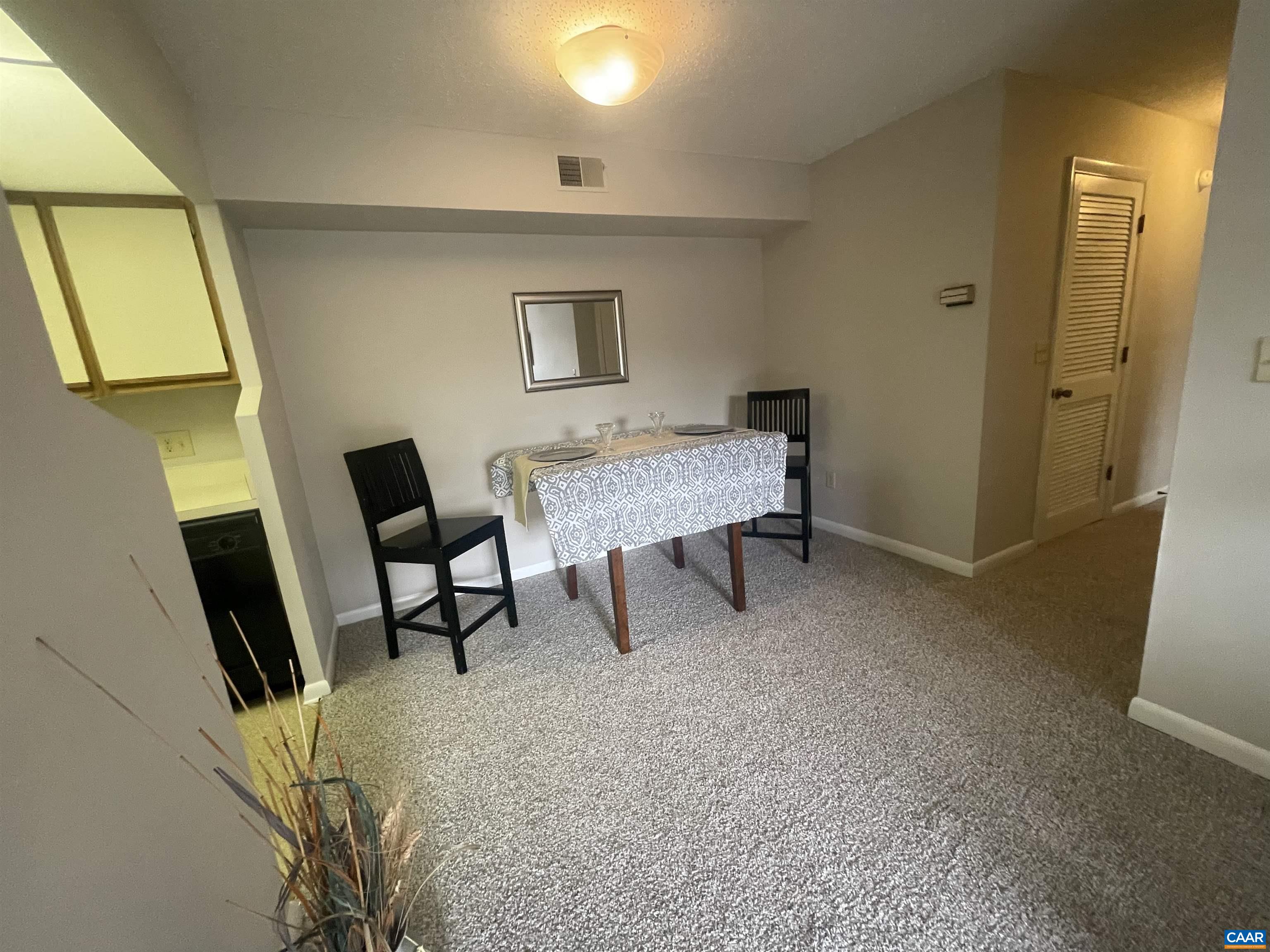 115 Turtle Creek Road, Unit 8 Charlottesville, VA 22901 - Photo 22 of 40 a workspace with furniture and bathroom