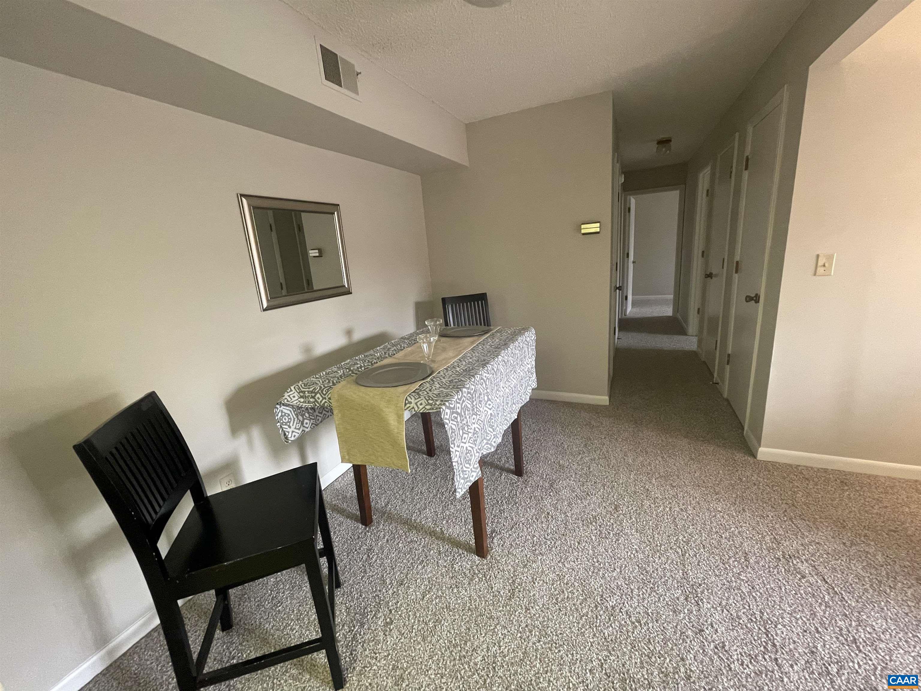 115 Turtle Creek Road, Unit 8 Charlottesville, VA 22901 - Photo 27 of 40 a dining room with furniture and window