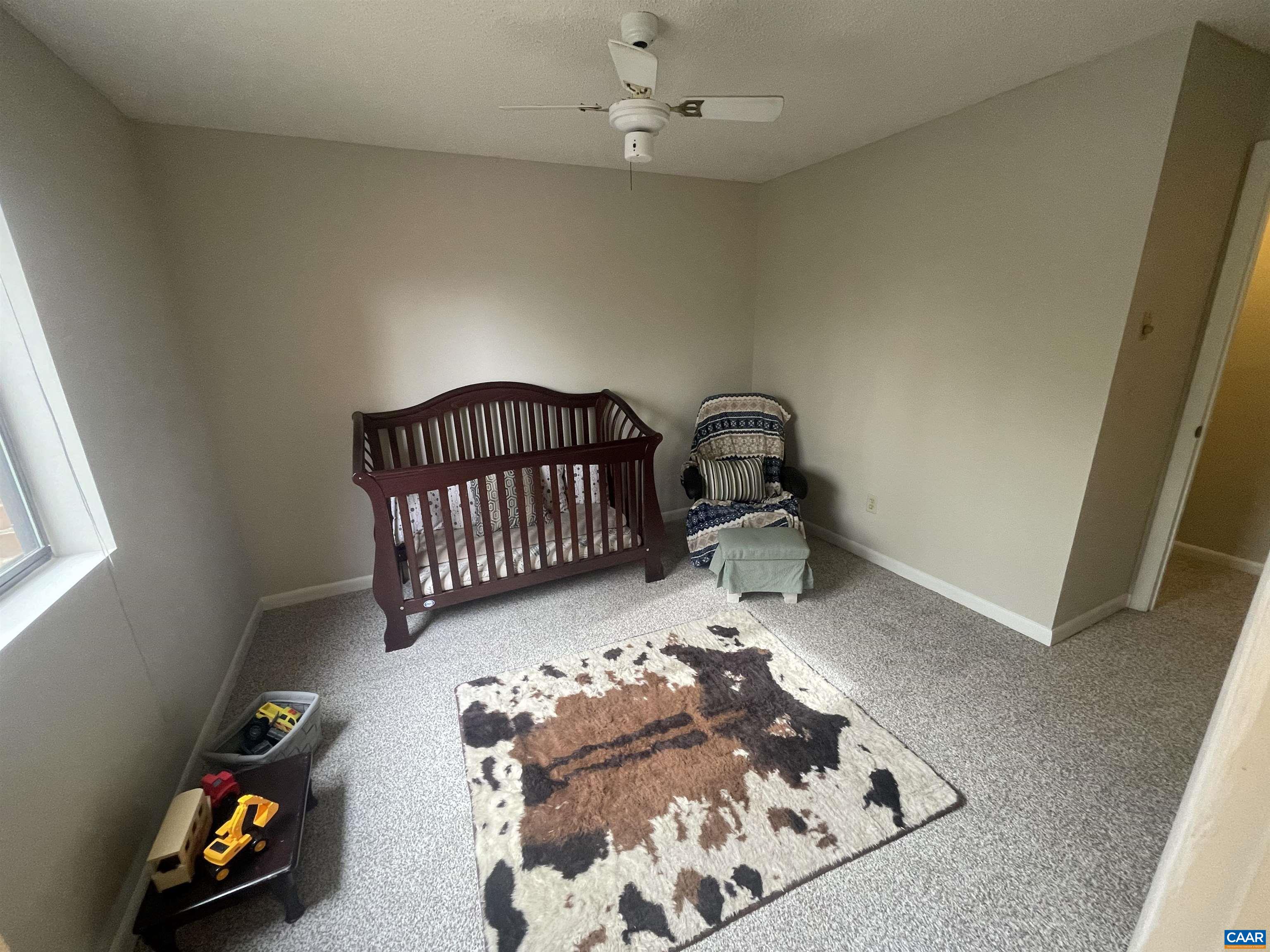 115 Turtle Creek Road, Unit 8 Charlottesville, VA 22901 - Photo 28 of 40 a bedroom with furniture and a window