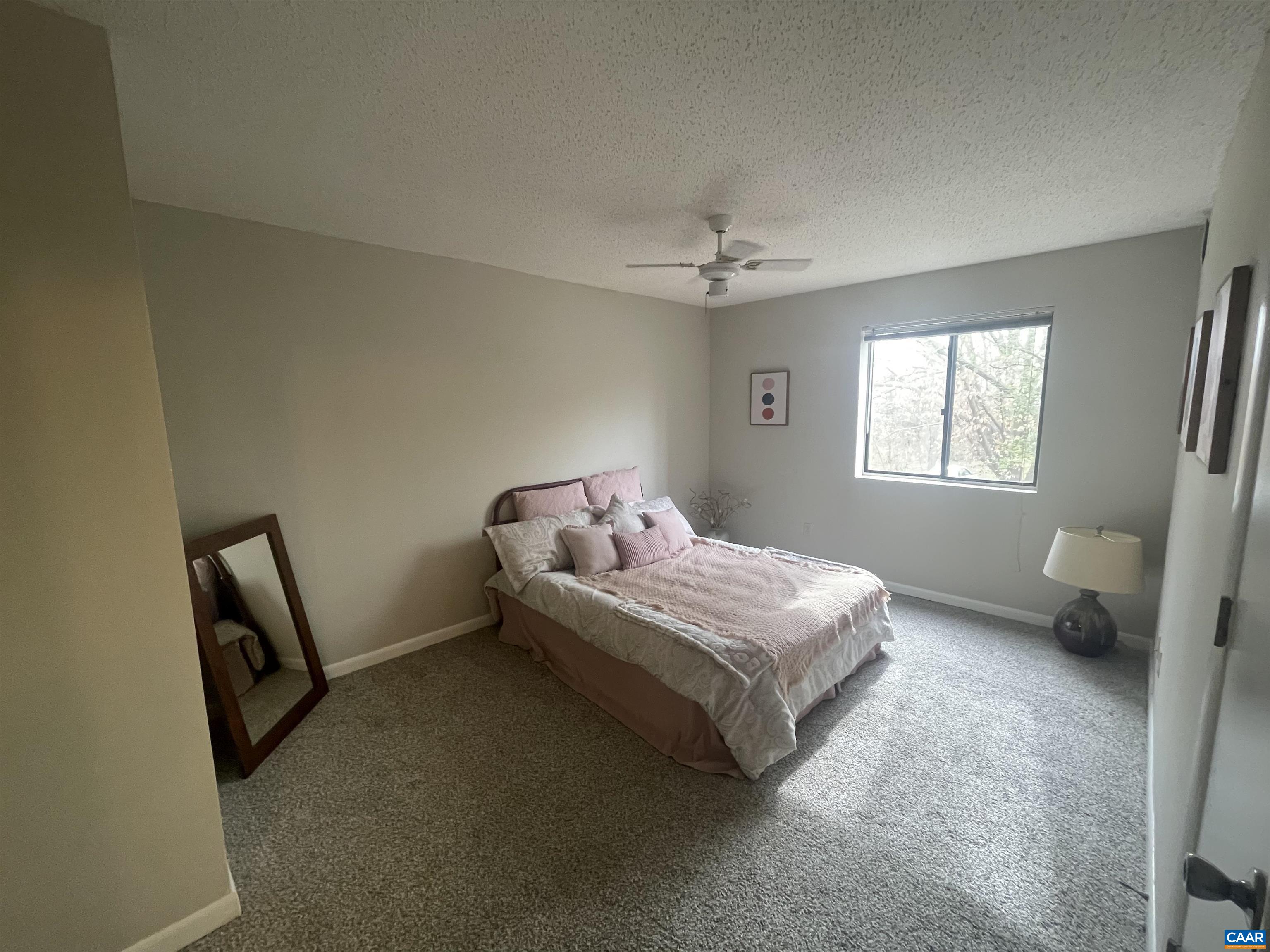 115 Turtle Creek Road, Unit 8 Charlottesville, VA 22901 - Photo 3 of 40 a bedroom with a bed and a window