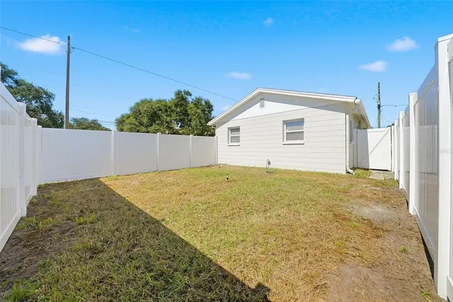 a view of backyard of house