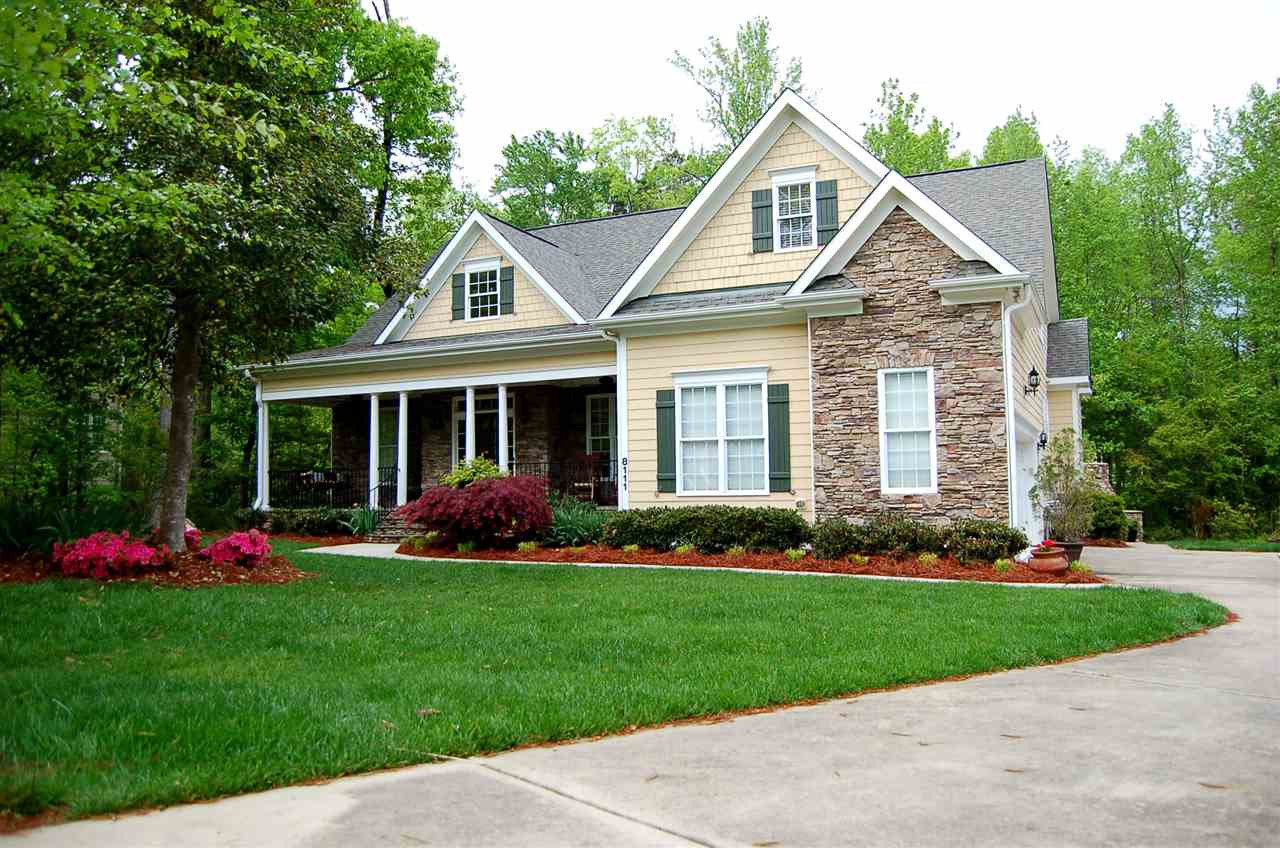 8111 Henderson Road Apex, NC 27539 - Photo 2 of 25 Cement Fiber and Stone veneer. Home exterior was painted within the last two years. Exterior Front