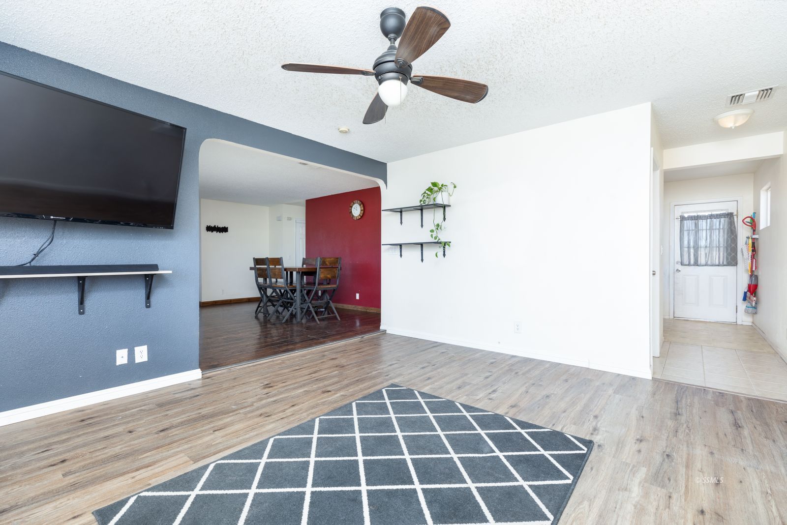 918 West Hughes Avenue Ridgecrest, CA 93555 - Photo 9 of 25 a view of a livingroom with furniture and a ceiling fan