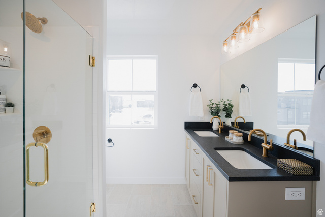 2012 West 1150 South, Unit 1018 Payson, UT 84651 - Photo 18 of 25 Bathroom with double vanity and a shower stall