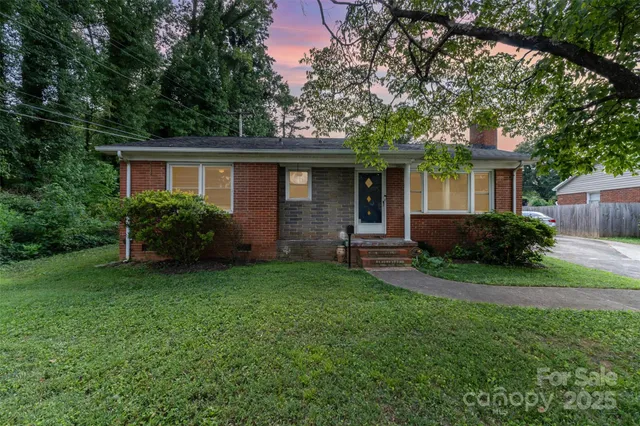a view of a house with a garden