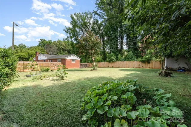 a house view with a garden space