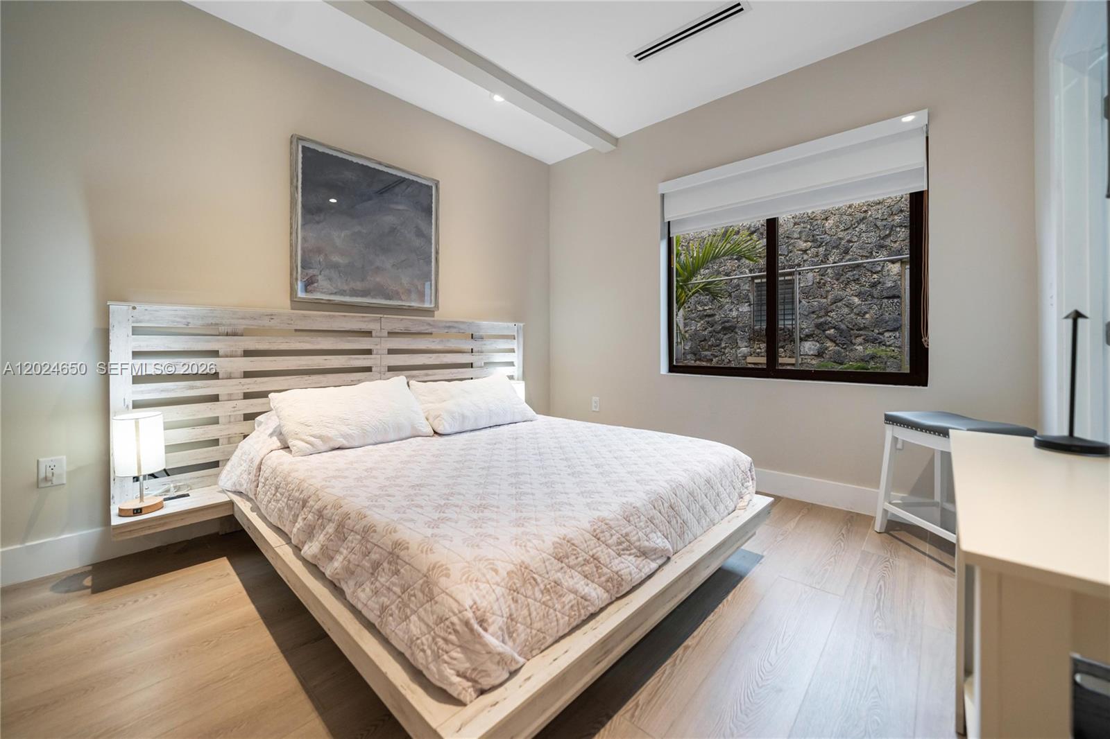 1663 Southwest 13th Street Miami, FL 33145 - Photo 37 of 112 a bedroom with a bed and a window