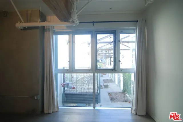 a view of a bathroom from a hallway