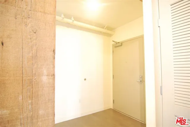 a view of a living room and floor to ceiling window