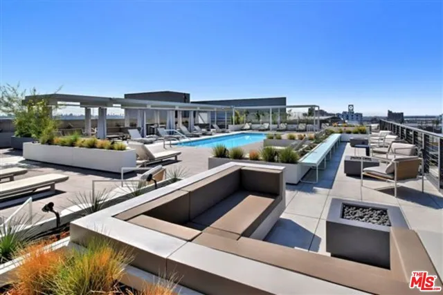 a view of a chairs and table in a patio