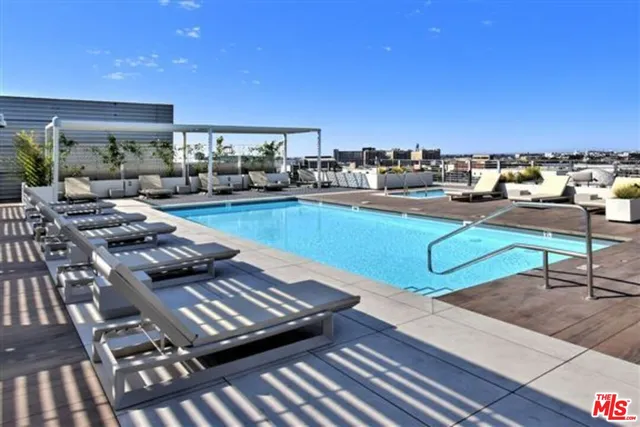 a view of a chairs and table in the patio