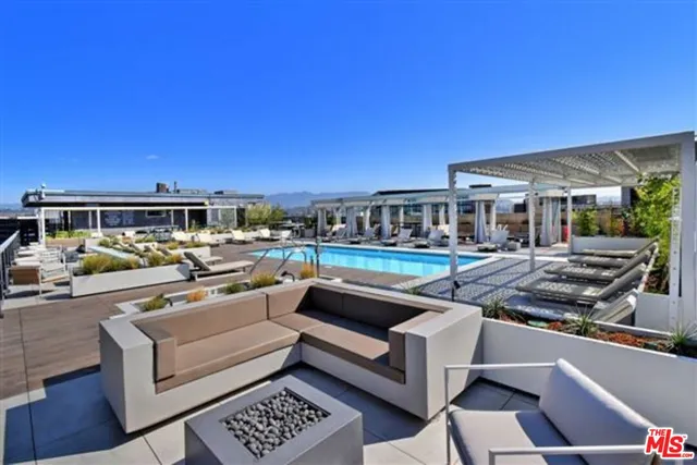 a view of a chairs and table in a patio