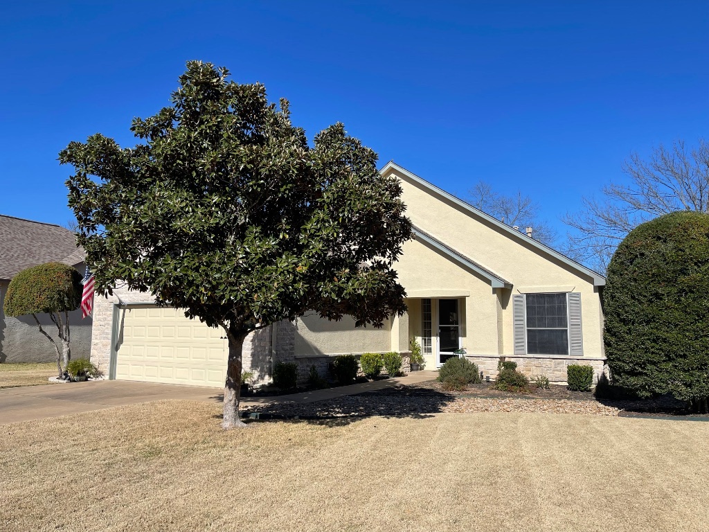 131 Ruellia Drive Georgetown, TX 78633 - Photo 1 of 1 a front view of a house with a yard