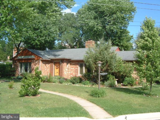2002 Plyers Mill Road Silver Spring, MD 20902 - Photo 1 of 29 a front view of a house with a yard