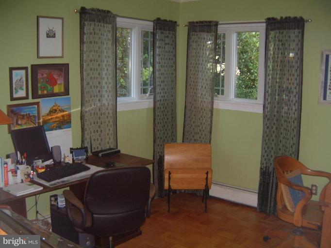 2002 Plyers Mill Road Silver Spring, MD 20902 - Photo 11 of 29 a workspace with furniture and a window