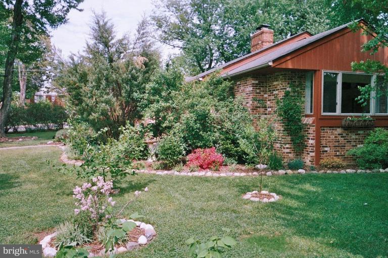 2002 Plyers Mill Road Silver Spring, MD 20902 - Photo 23 of 29 a front view of a house with a yard