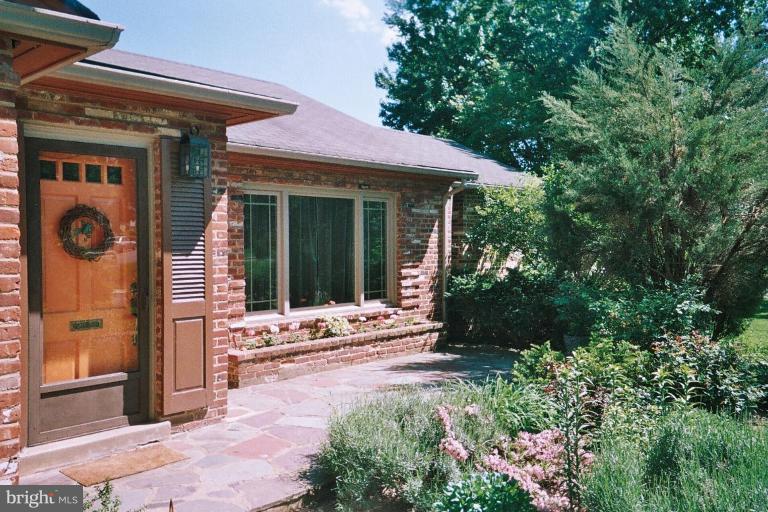 2002 Plyers Mill Road Silver Spring, MD 20902 - Photo 24 of 29 a view of a house with backyard and garden
