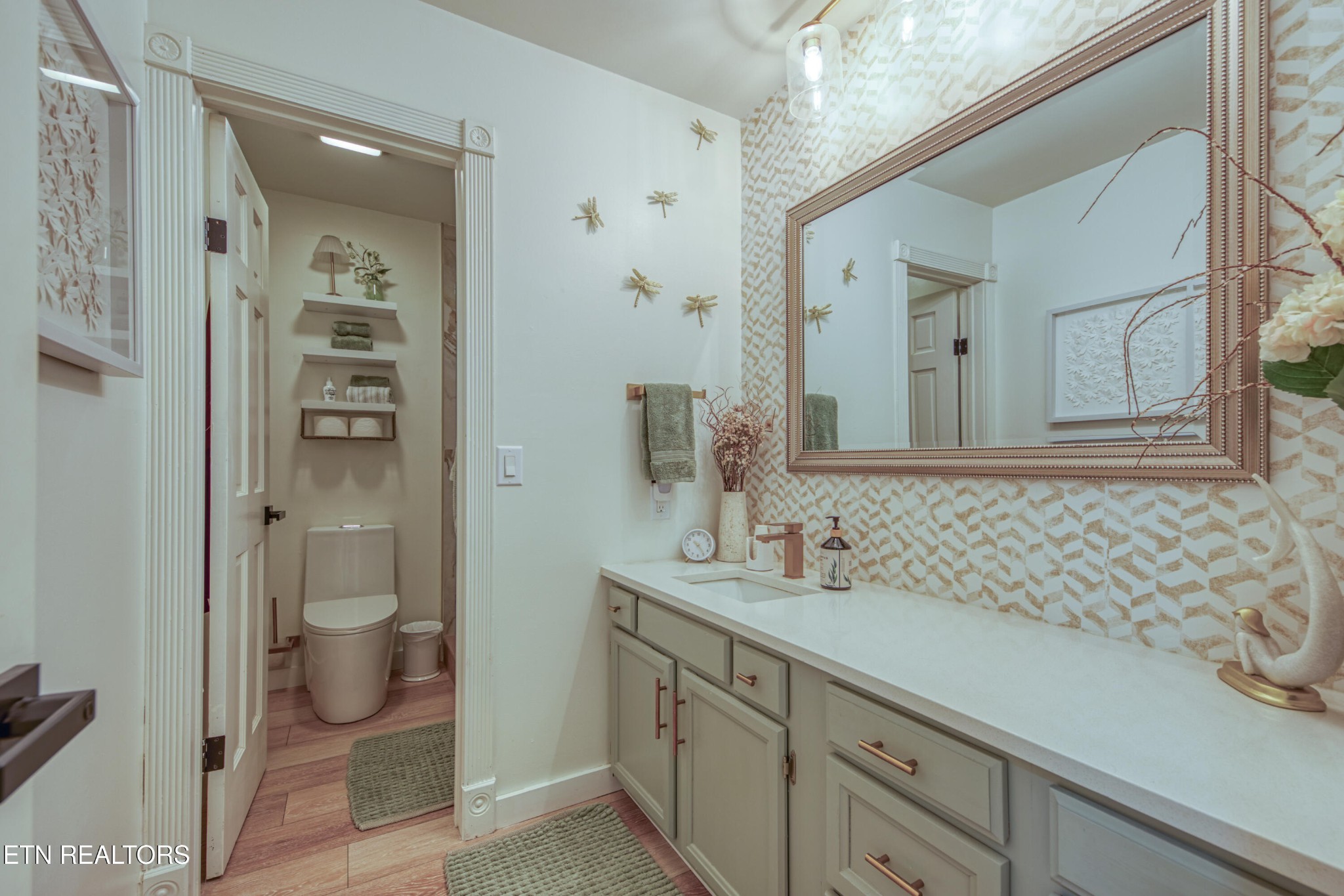 333 Enchanted Forest Way Sevierville, TN 37876 - Photo 14 of 42 a bathroom with a sink and a mirror