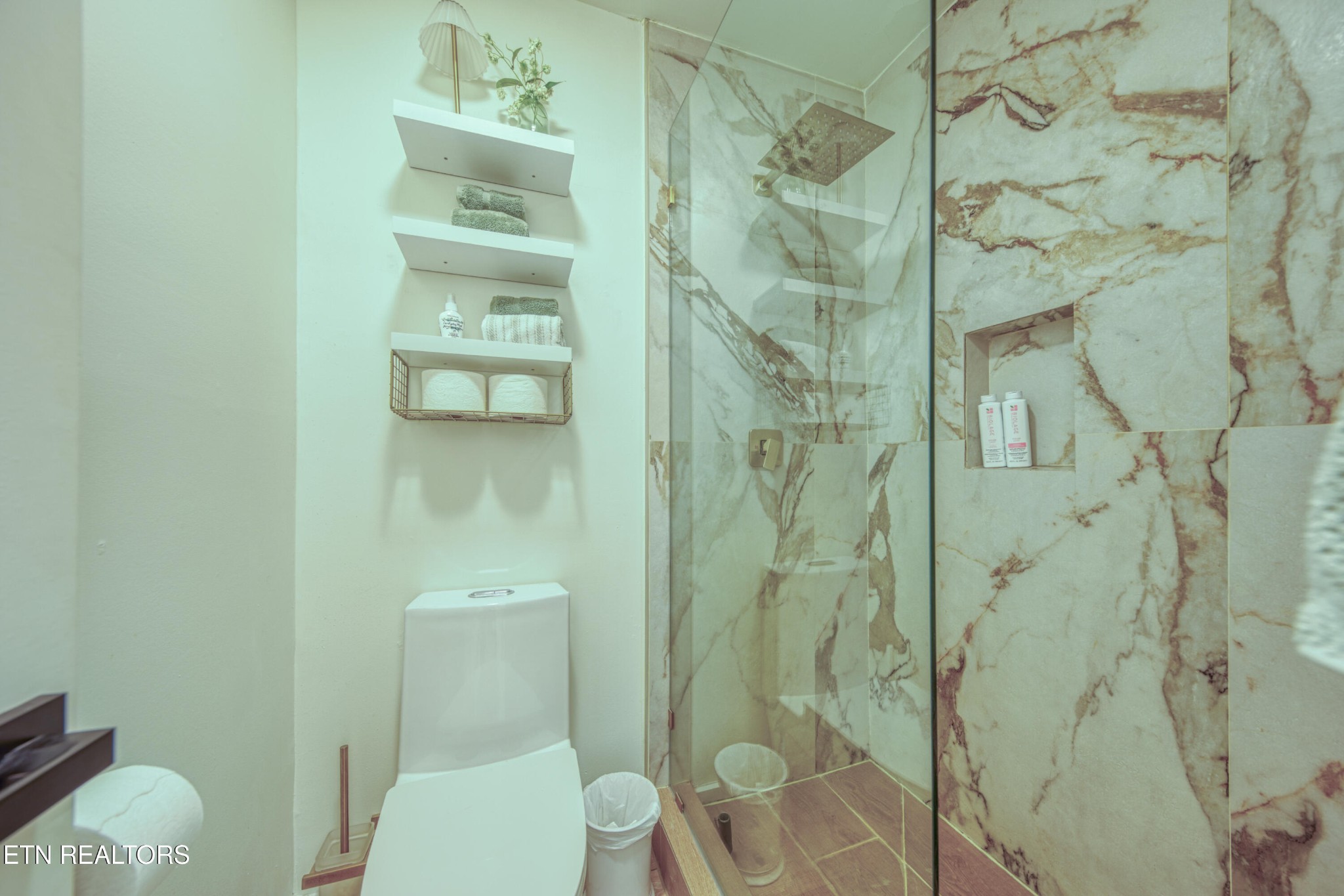 333 Enchanted Forest Way Sevierville, TN 37876 - Photo 15 of 42 a bathroom with a toilet and a shower