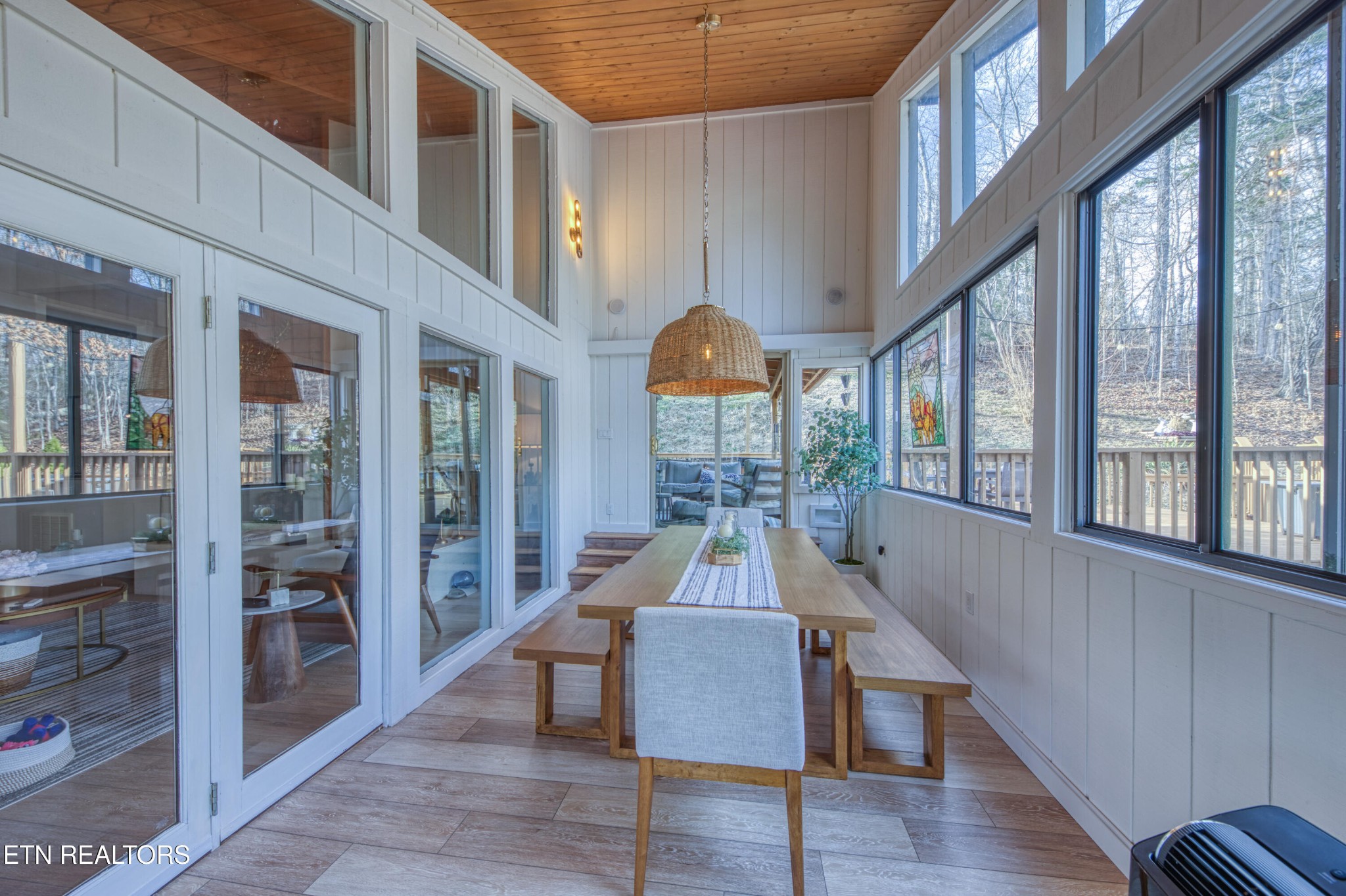 333 Enchanted Forest Way Sevierville, TN 37876 - Photo 19 of 42 a view of a dining room with furniture window and wooden floor