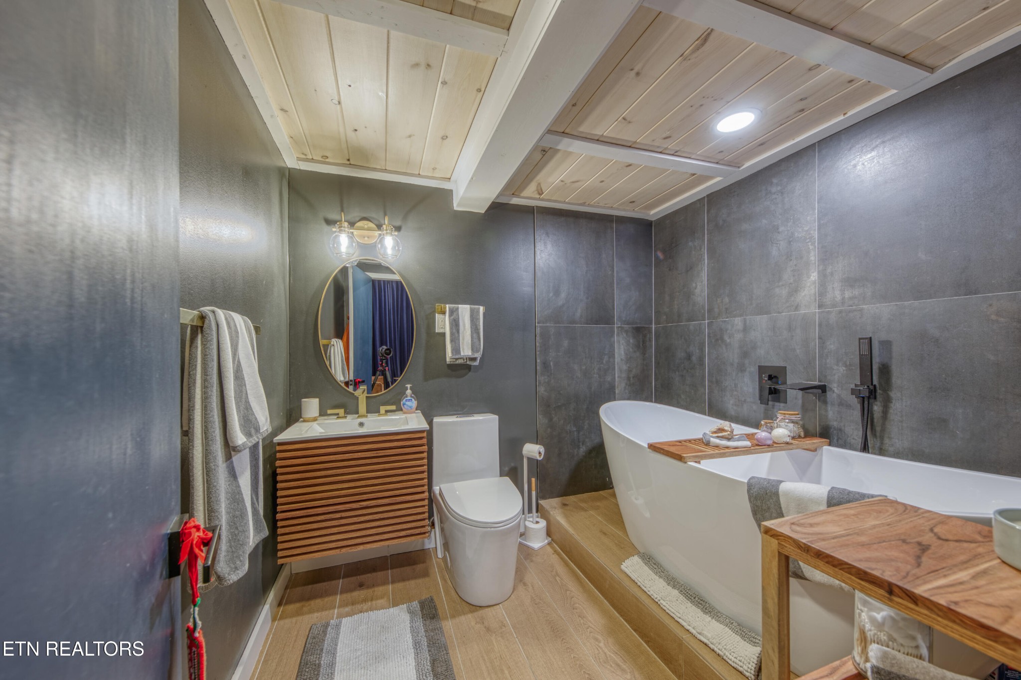 333 Enchanted Forest Way Sevierville, TN 37876 - Photo 26 of 42 a bathroom with a toilet sink and mirror
