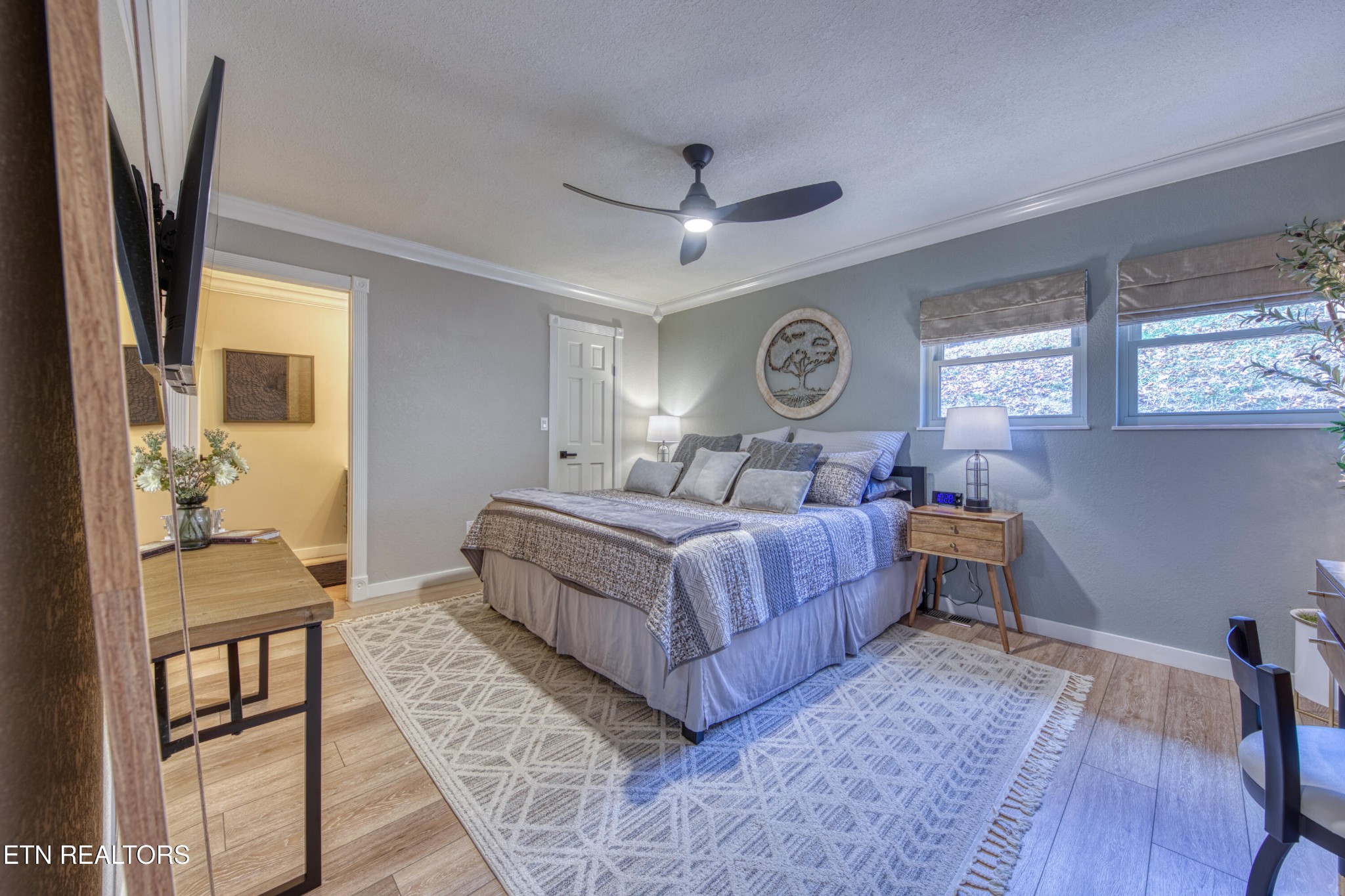 333 Enchanted Forest Way Sevierville, TN 37876 - Photo 9 of 42 a bedroom with a bed window and a table