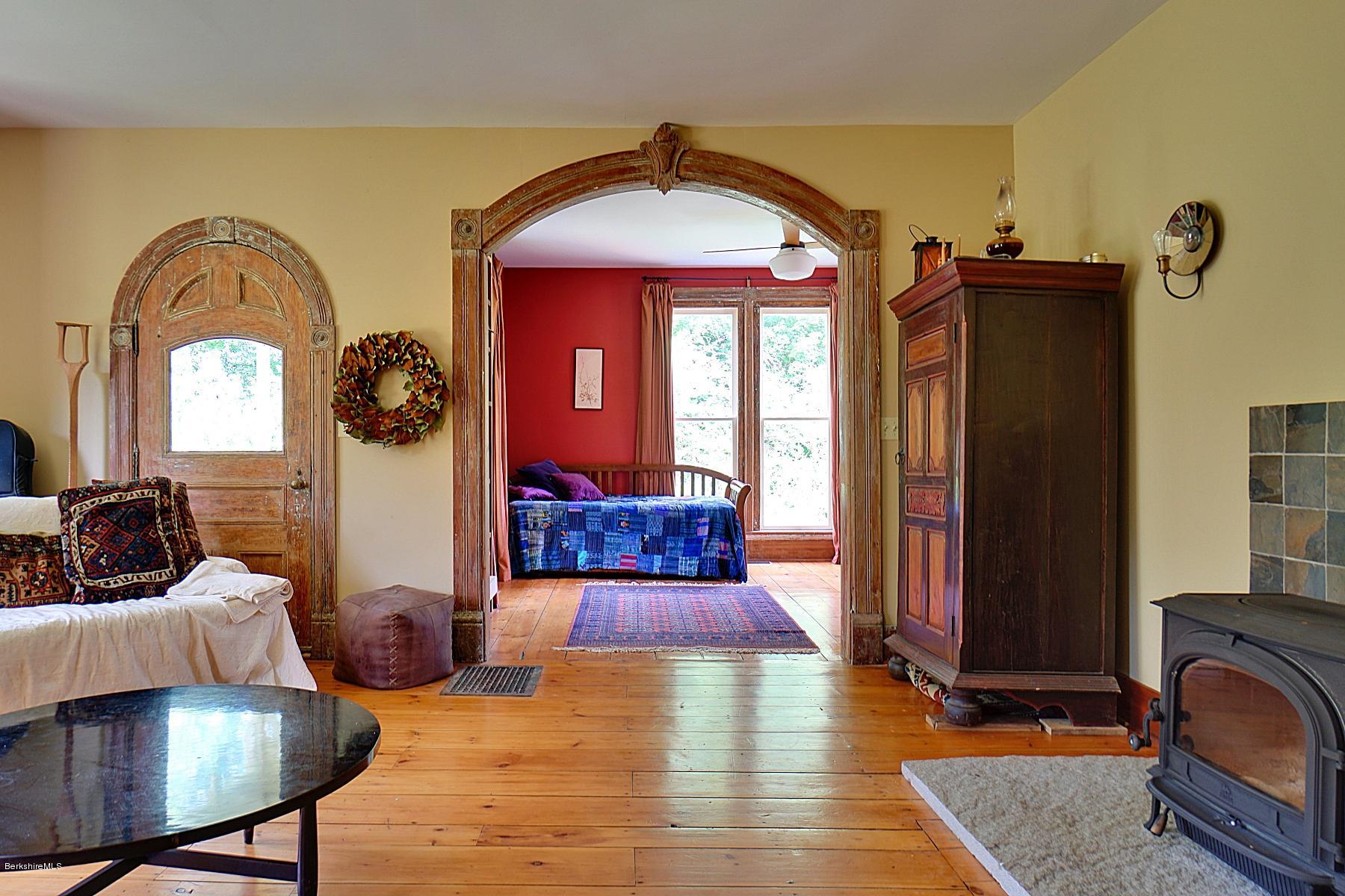 200 Main Road Monterey, MA 01245 - Photo 12 of 30 a living room with furniture and a fireplace