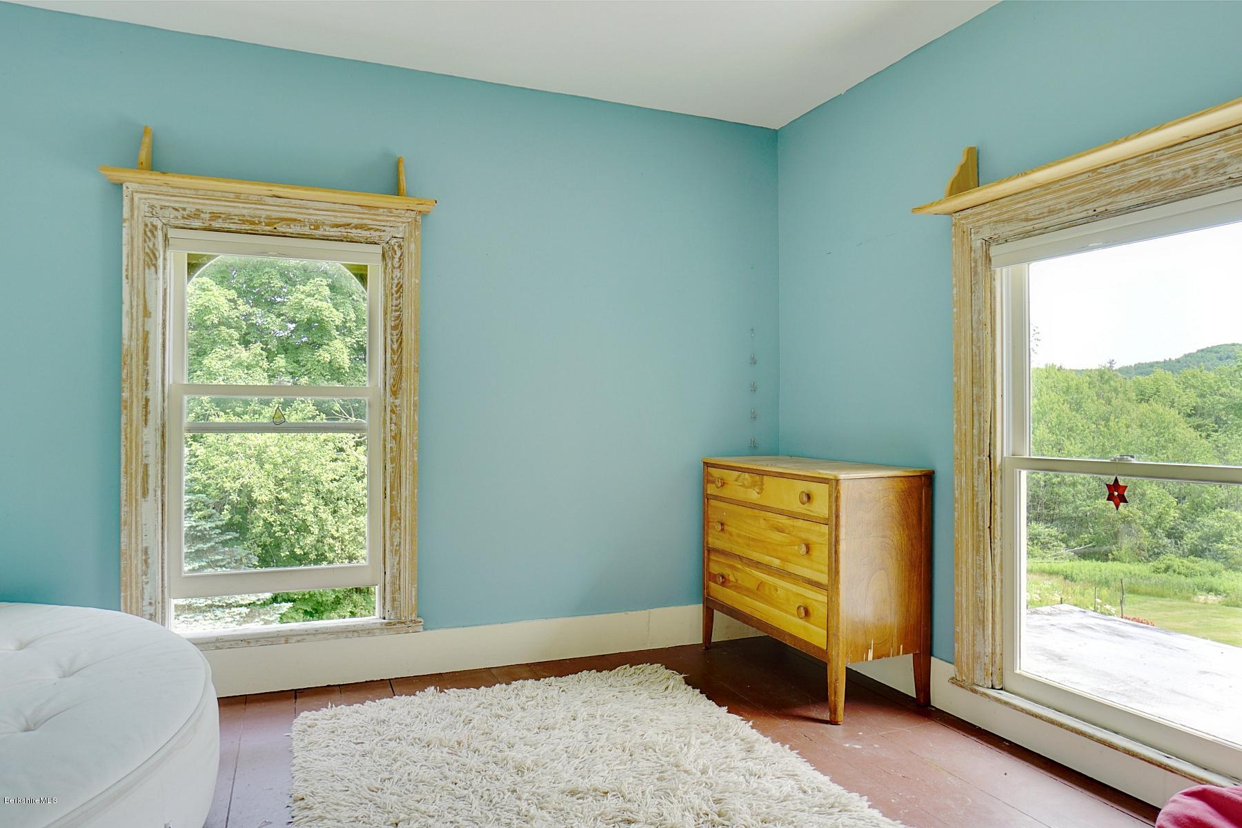 200 Main Road Monterey, MA 01245 - Photo 19 of 30 a view of an empty room with a window