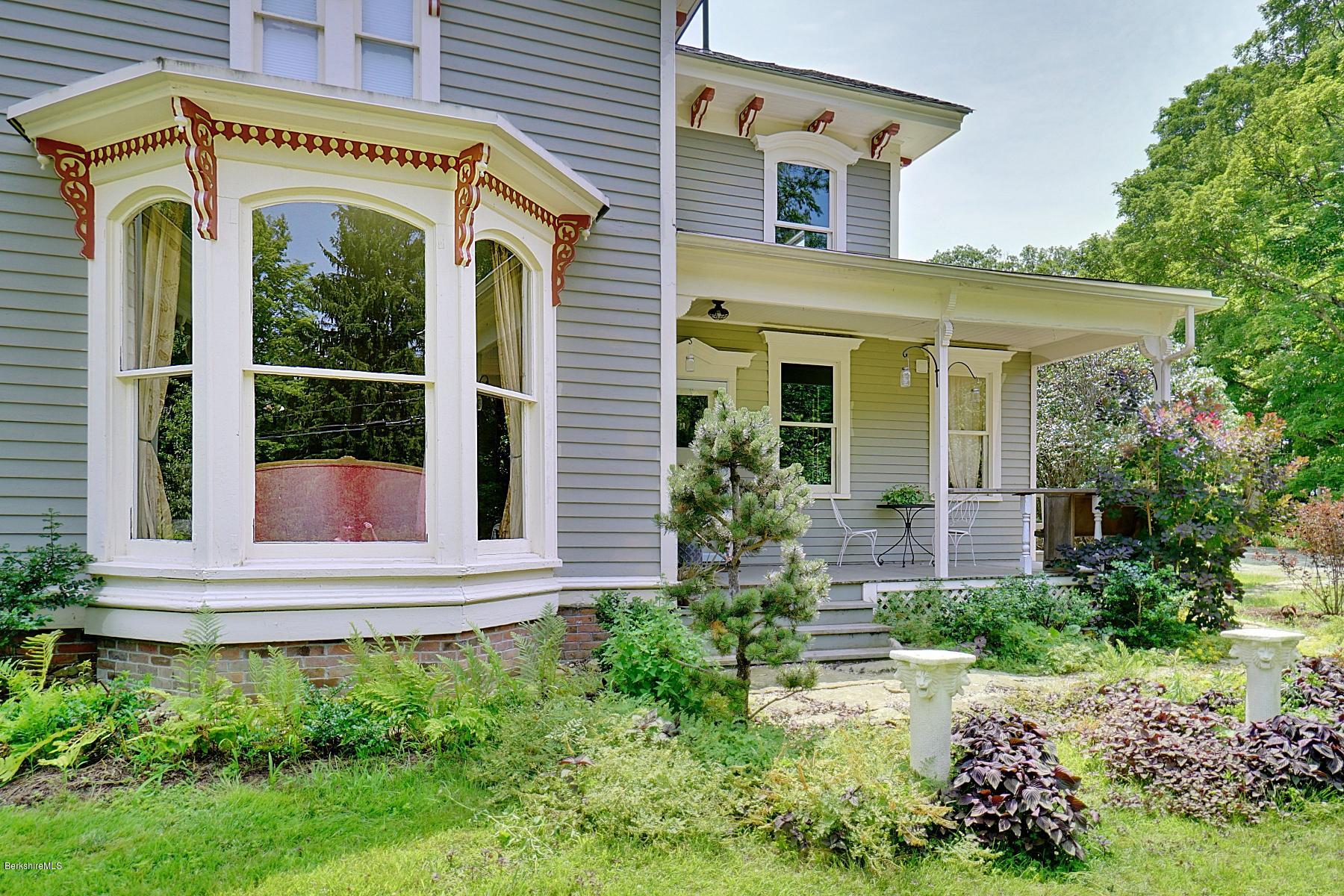 200 Main Road Monterey, MA 01245 - Photo 3 of 30 a front view of a house with garden
