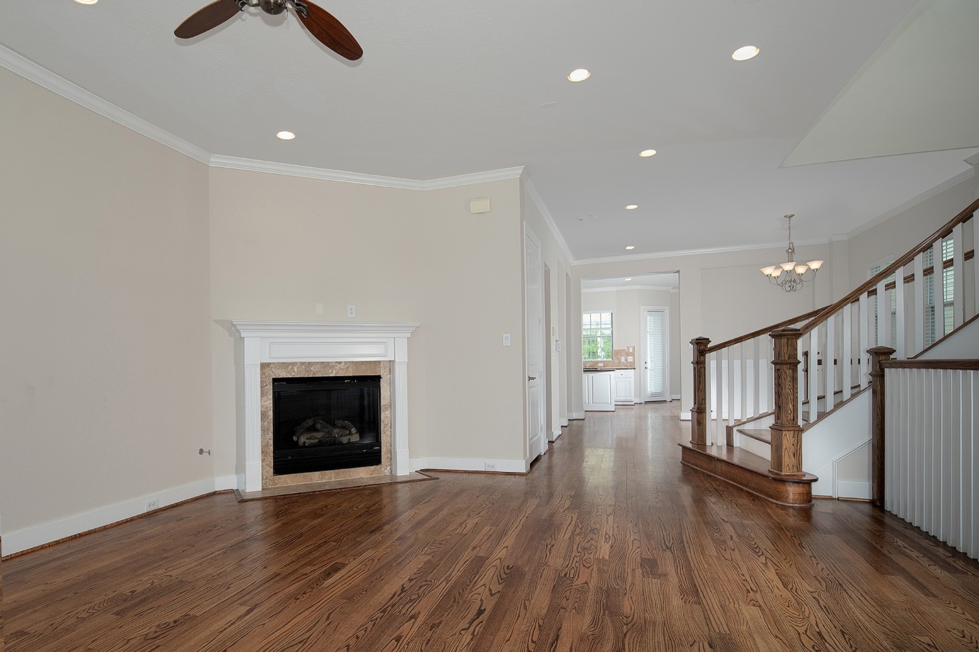 190 West Breezy Way Spring, TX 77380 - Photo 11 of 33 The open layout leads into a bright kitchen, enhancing the home's inviting atmosphere.